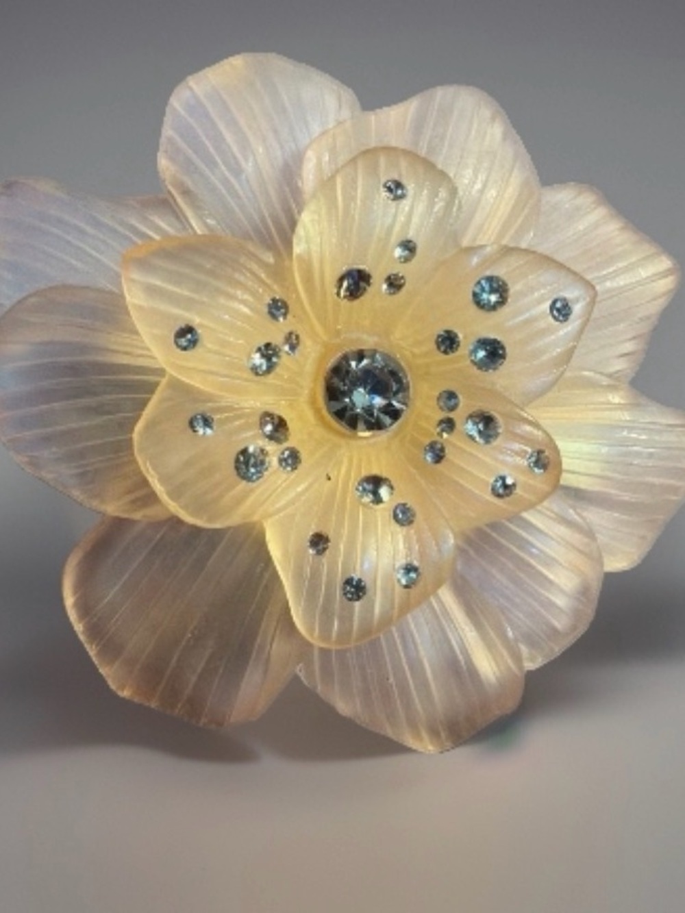 Monet Peach Lucite/Plasti. Iridescent Flower Brooch w Clear AB Crystal Accents